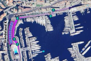 View from Grandstand K showing Formula 1 cars negotiating the Monaco hairpin