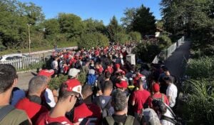 Italian Formula 1 fans walking to the Monza circuit from the train station